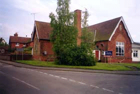  The School with the old school house behind 